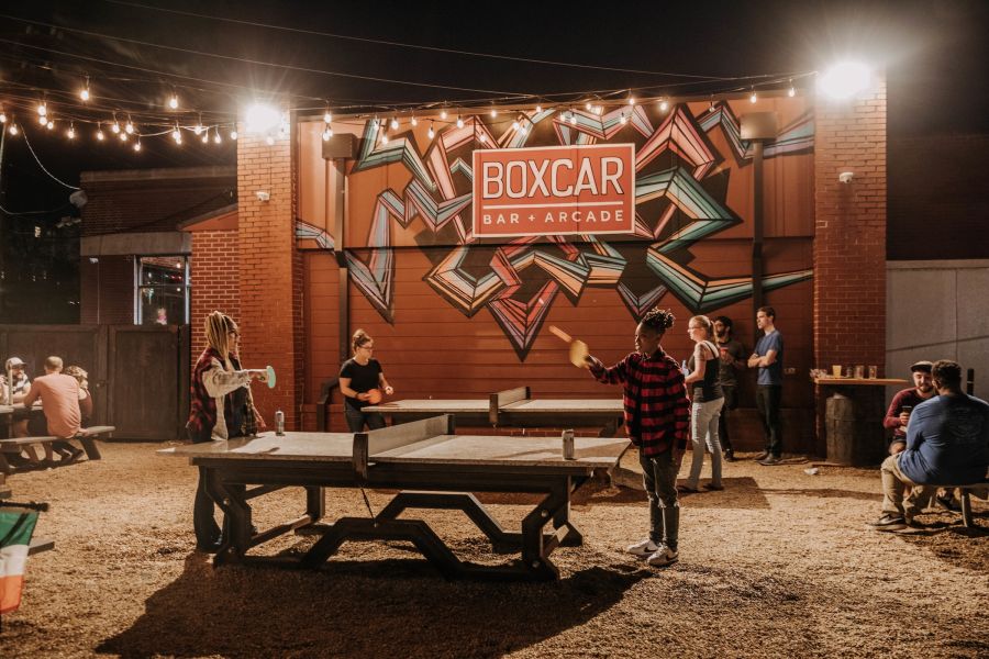 Boxcar Bar + Arcade in downtown Durham features a full bar, arcade games, a year-round patio, and private event space.