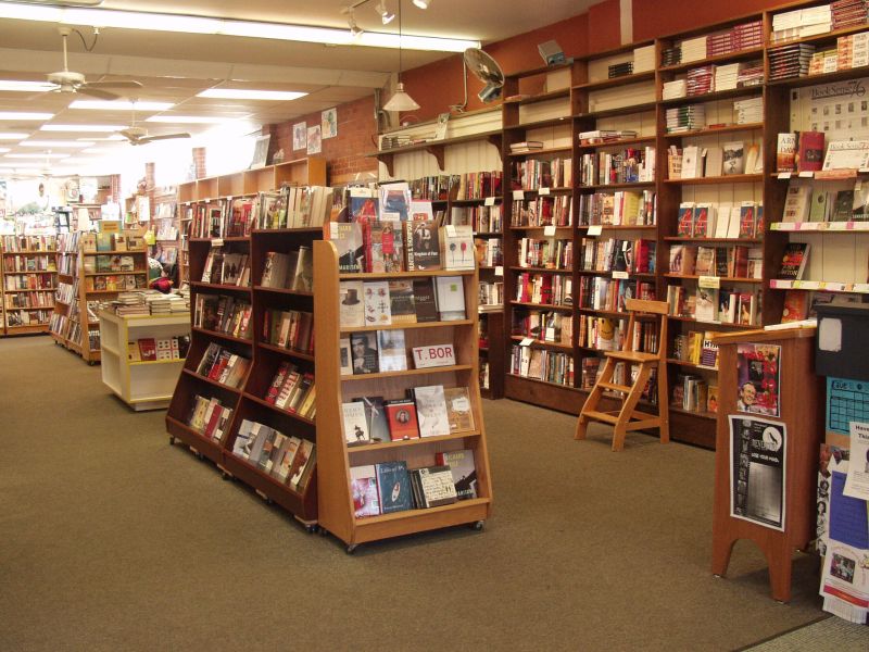 Books stack high on shelves waiting to be enjoyed by customers at The Regulator book store in Durham, NC.