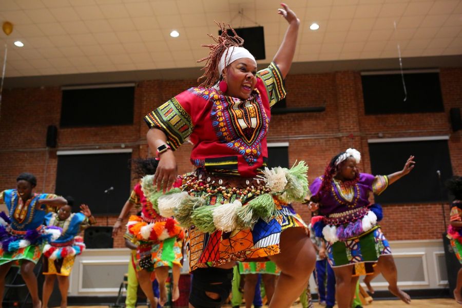 A performer dances during Kwanzaafest at the Durham Armory.