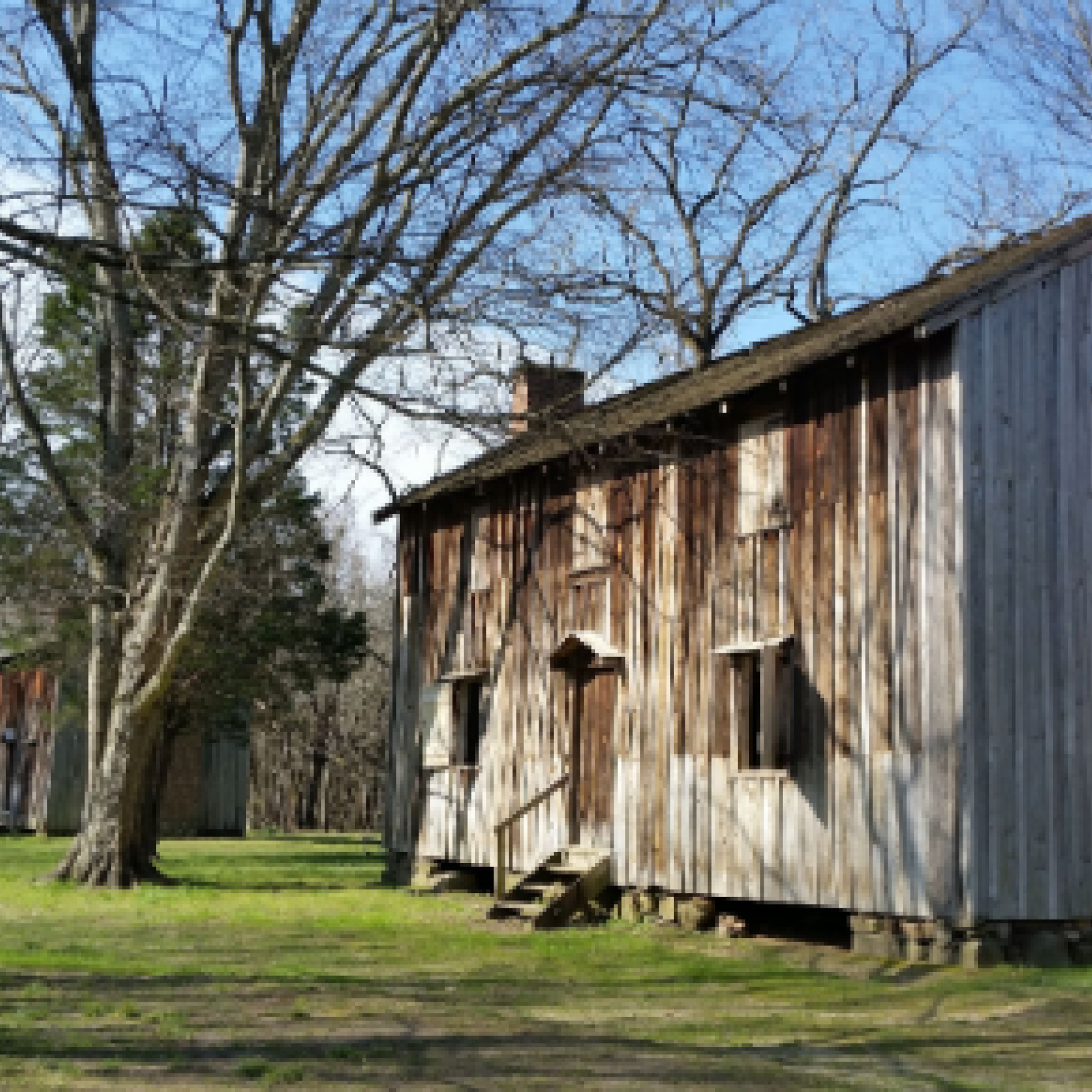 An old building sits alongside others at Historic Stagville in Durham